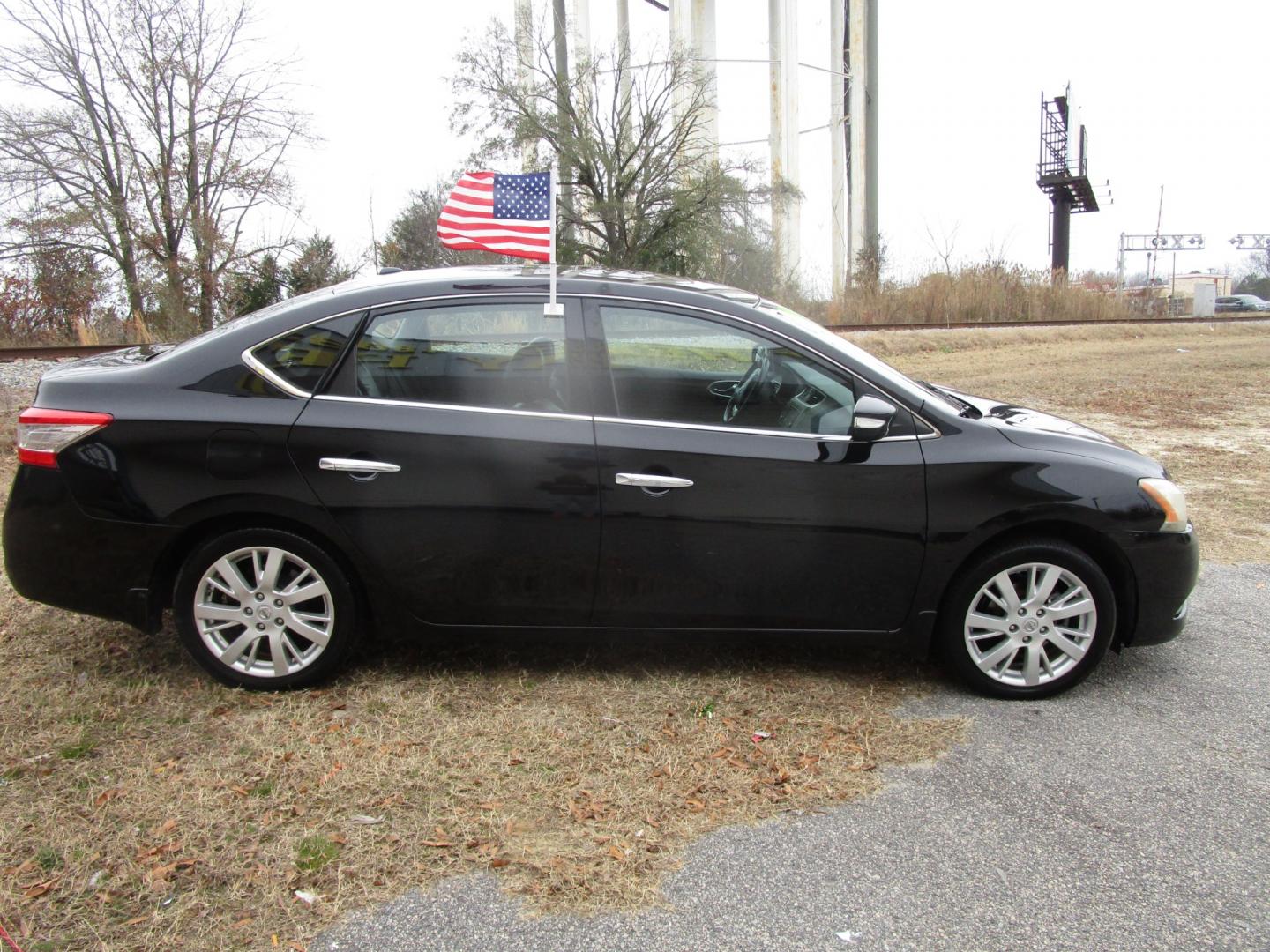 2014 Black Nissan Sentra S 6MT (3N1AB7AP6EY) with an 1.8L L4 SFI DOHC 16V engine, 6-Speed Automatic transmission, located at 2553 Airline Blvd, Portsmouth, VA, 23701, (757) 488-8331, 36.813889, -76.357597 - Photo#4